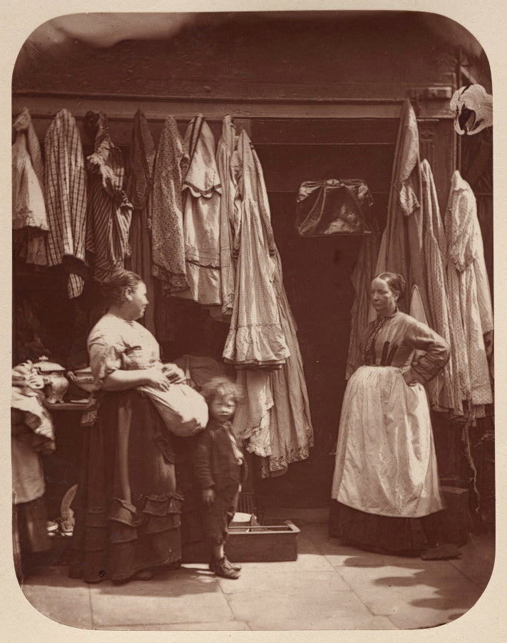 An Old Clothes Shop, Seven Dials by John Thomson (Scottish, 1837–1921) - Classic Art canvas print