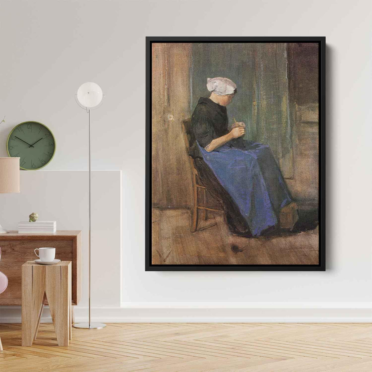 Young woman knittingby Vincent van Gogh Canvas Print