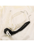 Knotted Pearl Necklace