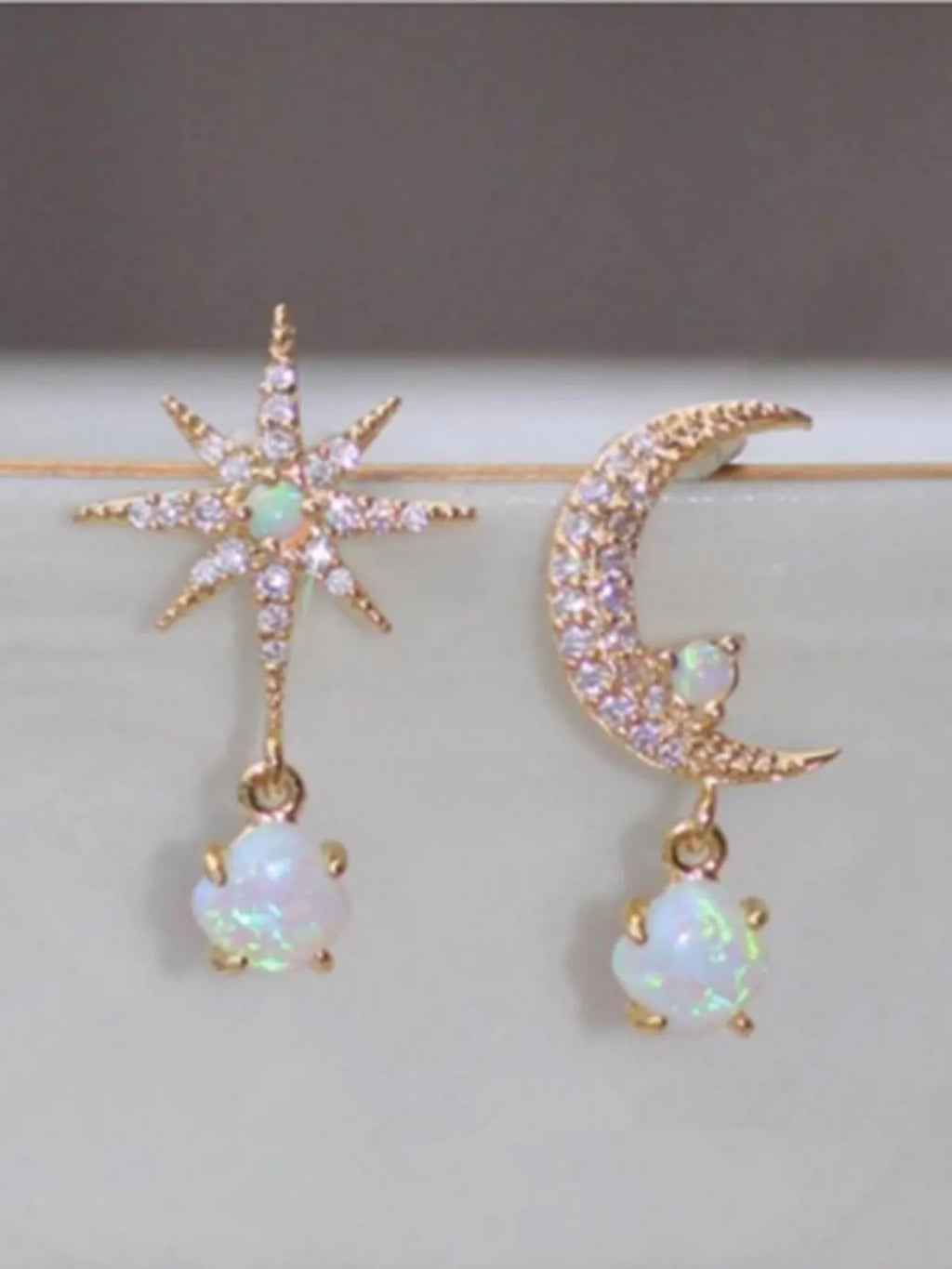 Moon star asymmetric earrings