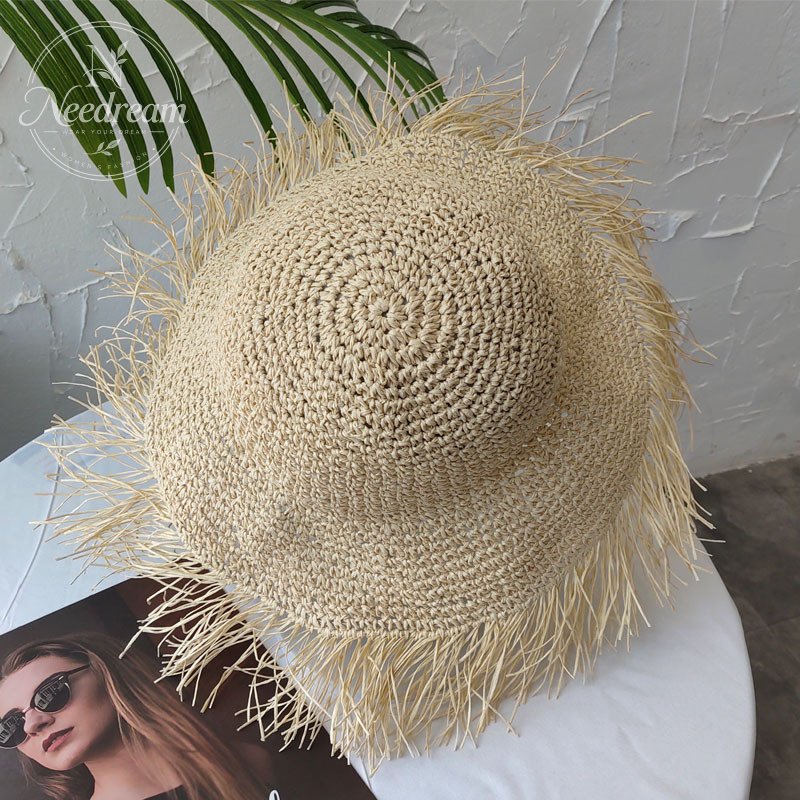 Wide-Brimmed Hand-Woven Straw Hat With Tassels