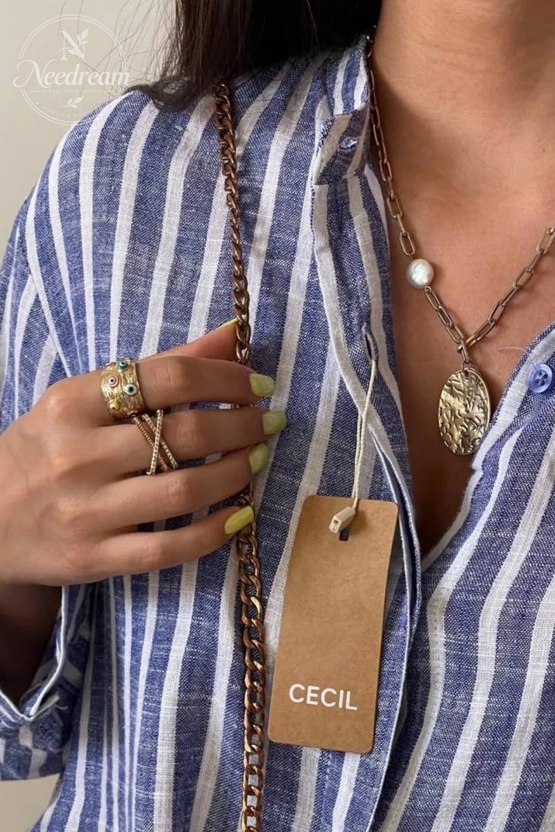 Striped Shirt With Buttons On The Side
