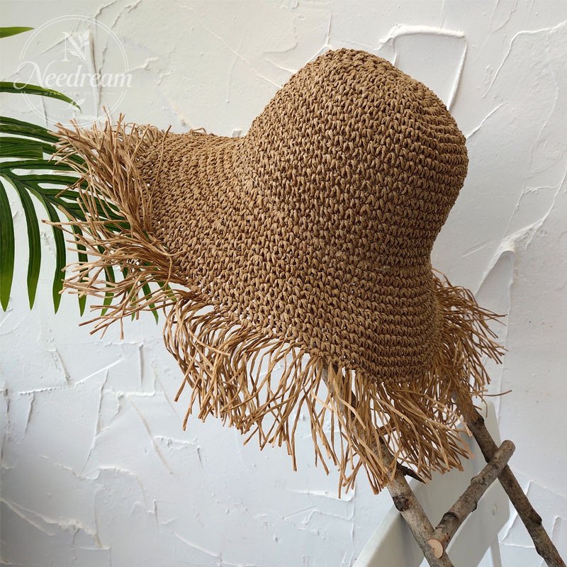 Wide-Brimmed Hand-Woven Straw Hat With Tassels