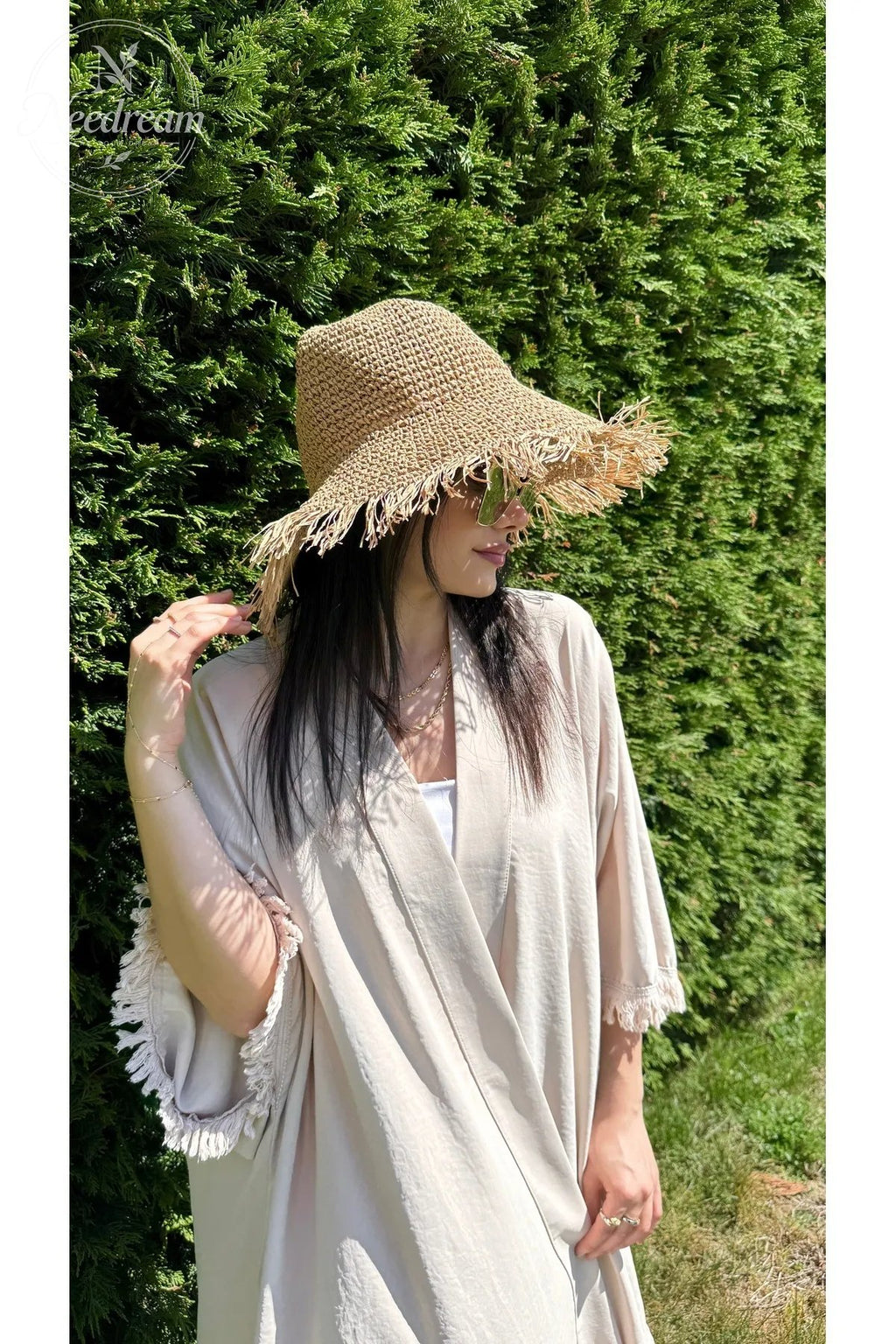 Wide-Brimmed Hand-Woven Straw Hat With Tassels