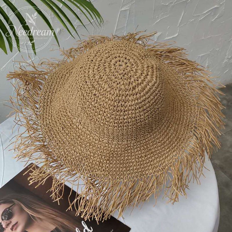 Wide-Brimmed Hand-Woven Straw Hat With Tassels